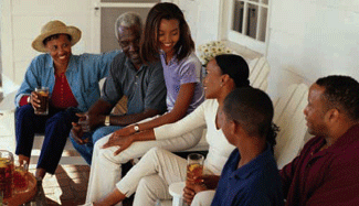 Photo of a family sitting on a porch