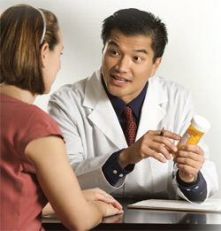Photo of a doctor talking with a patient