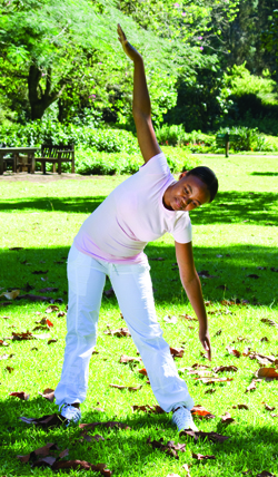 Photo of a young girl stretching