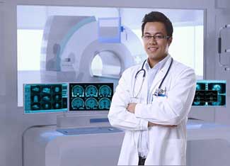 IA technician assists a patient undergoing a magnetic resonance imaging (MRI) scan A technician assists a patient undergoing a magnetic resonance imaging (MRI) scan