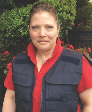 Photo of a woman wearing a cooling vest