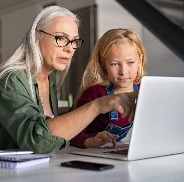 Woman with grandchild on computer