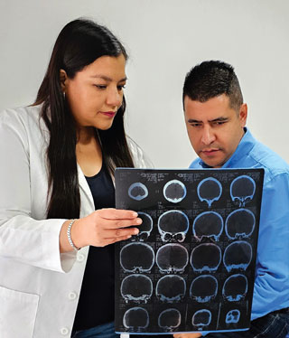 Photo of doctor and MRI with patient